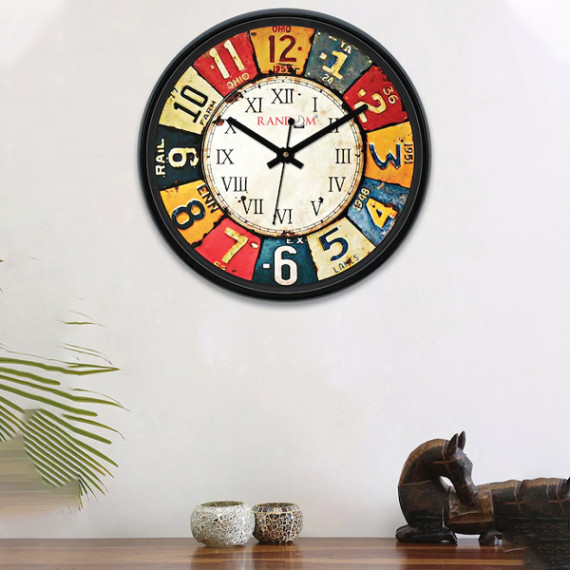 https://retrofashionzs.com/products/multicoloured-round-printed-analogue-wall-clock-30-cm