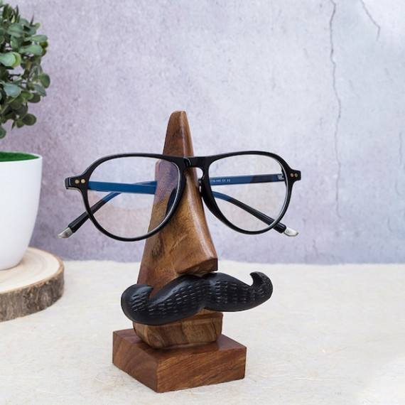 https://retrofashionzs.com/products/brown-handcrafted-eyeglass-holder-showpiece