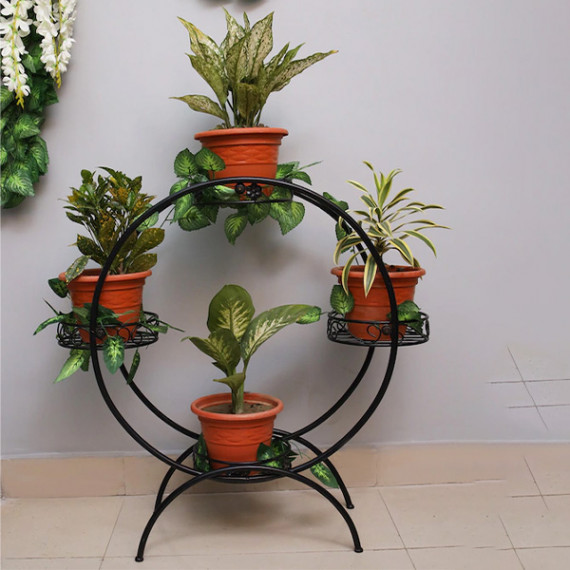 https://retrofashionzs.com/products/set-of-4-black-solid-metal-planters-with-round-shaped-stand