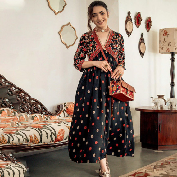 https://retrofashionzs.com/products/black-orange-ethnic-motifs-printed-maxi-dress